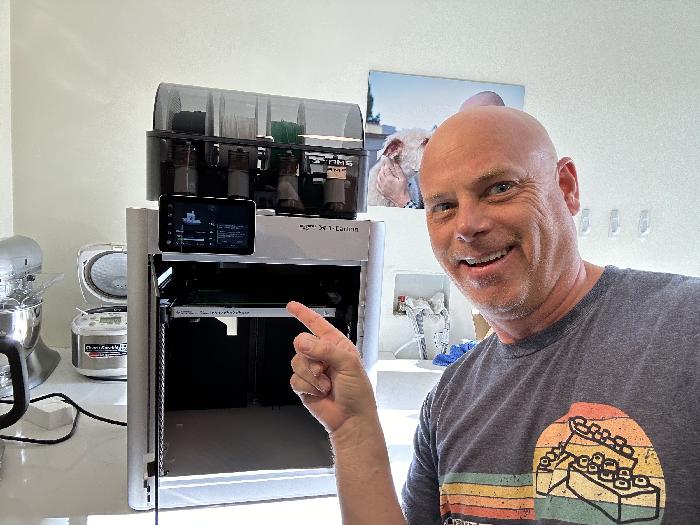 Tyson at the Bambu Lab X1 Carbon printer that makes every LittleDevLab piece